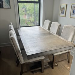 Johnelle Dinning Table And 6 Chairs 