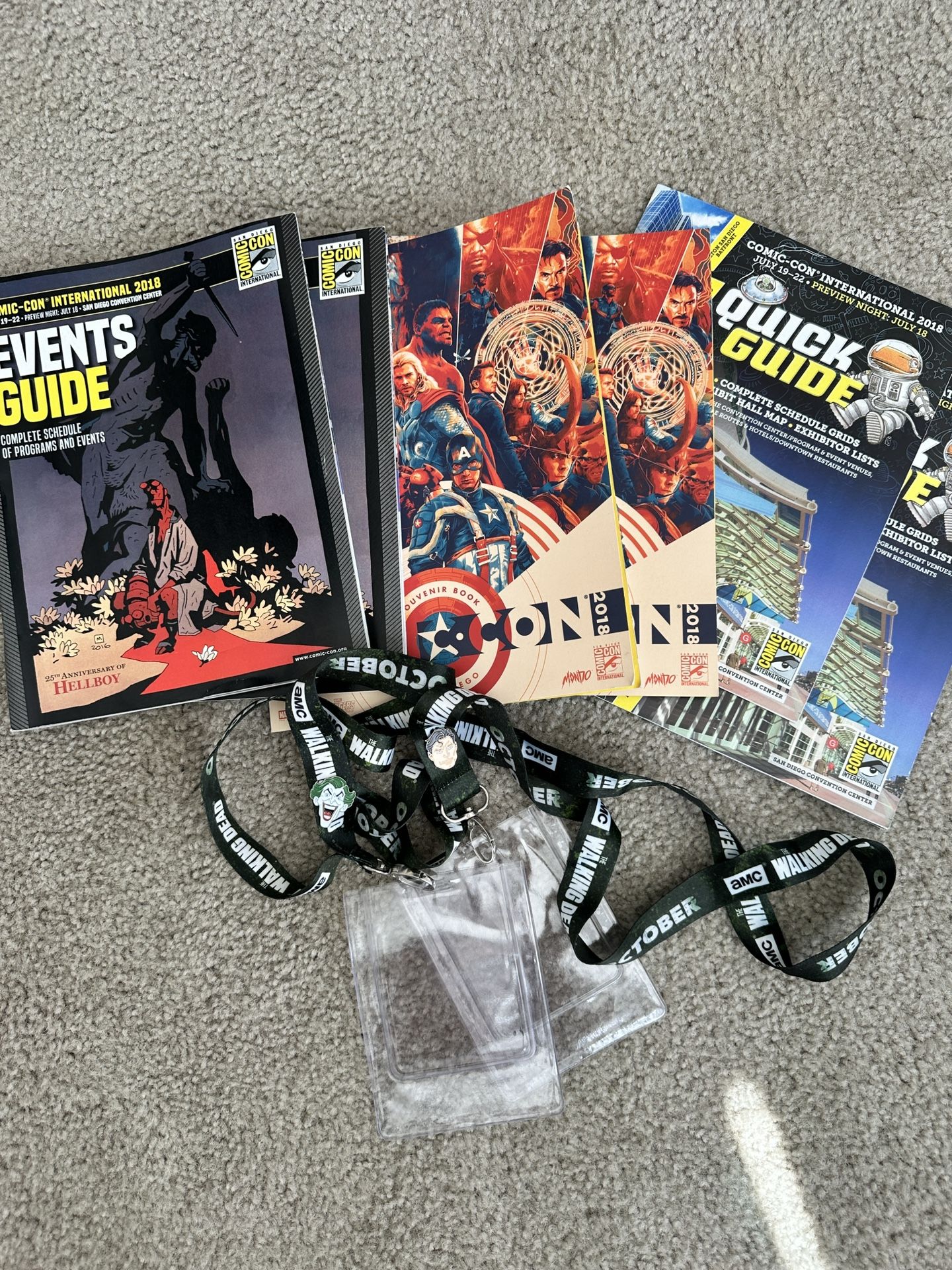 2018 San Diego Comic-Con International Events Guide (2), Souvenir Book (2), Quick Guide (2), Lanyards (2), Joker & Superman Pins 