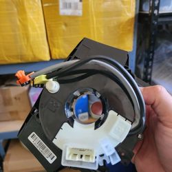 2005-2015 Nissan Titan Clock Spring Part Number 25560-ZH38B (Used, No Angle Sensor Or Traction Control Connection