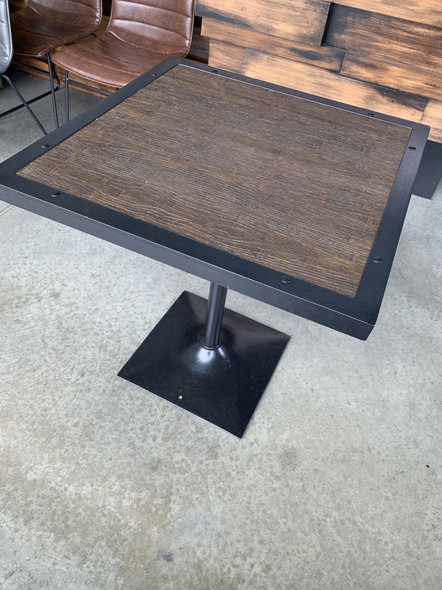Wooden table with metal frame