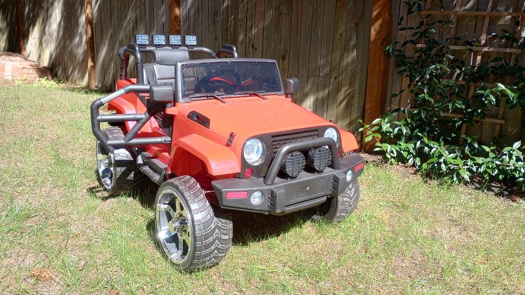 Upgraded Kids Ride-On vehicle Red Jeep