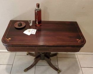 Beautiful 19 Th C. Elegant English Rosewood Rectangular Top Game Table On Metal Claw Feet. Top opens to reveal leather tooled inlay top.