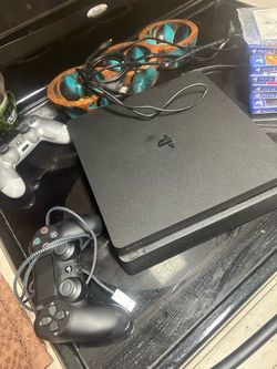 Sony PlayStation 4 Slim Console 1TB with Controllers and Games