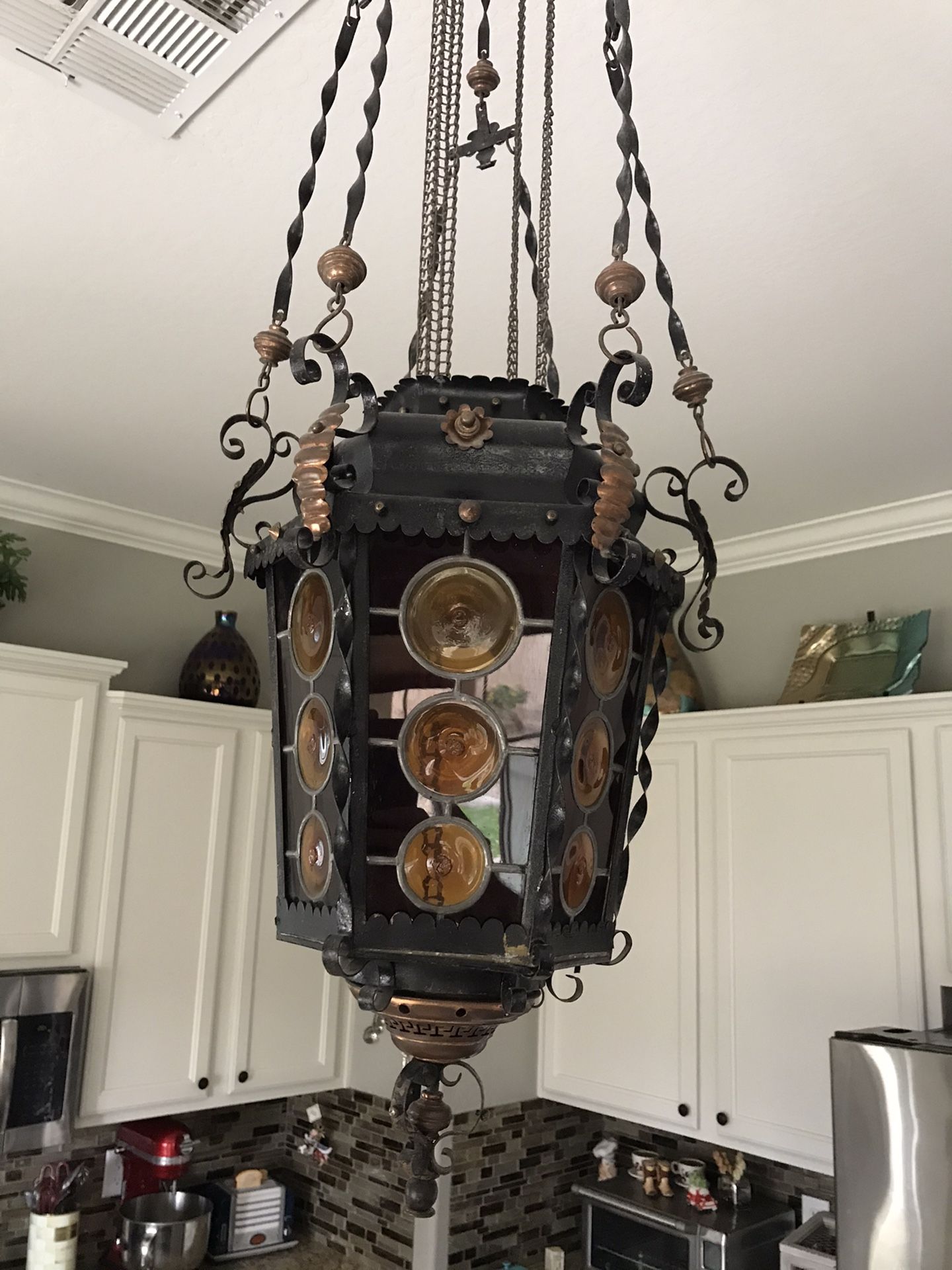 Antique leaded stained glass lantern. 44 inches including mounting. $600 obo