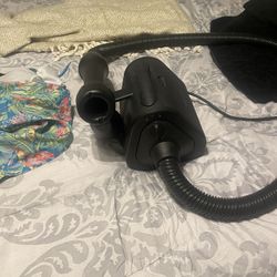 Hair Dryer And A Hair Straighten 