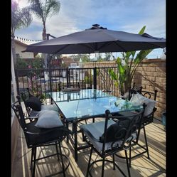 7-Piece Bar Height Patio Set – Swivel Chairs w/ Cushions, Thick Glass Table, Umbrella