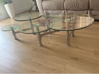 Mesa de cristal de centro  desplegable
