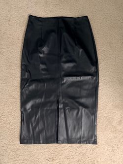 Size S faux leather midi skirt. Very stretchy.