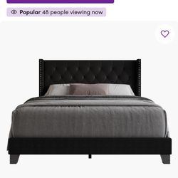 Ameire Upholstered Wingback Bed