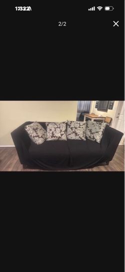 Free Huge four seater probably five seater family couch with pillows and couch cover included