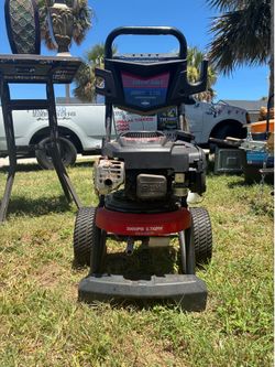 Pressure washer with hose