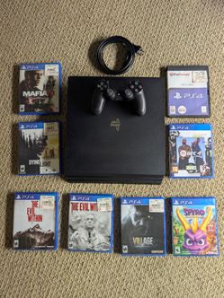 PS4 with 1 controller and games