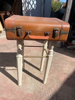 Suitcase side table drawer that opens and latches