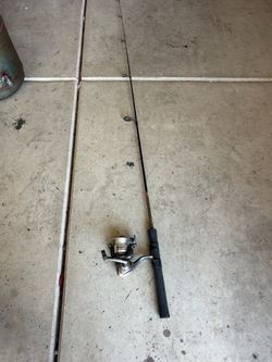 Ugly Stik ultra light with reel. Pole is 4’ 8”