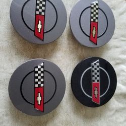 Corvette center caps 3 gray one black