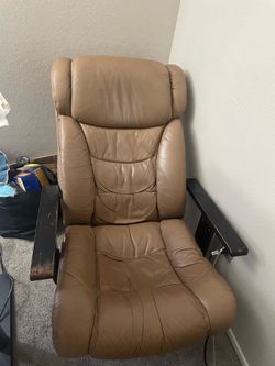 Brown leather recliner chair