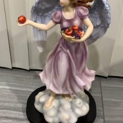 Angel Giving Out Fruit Statue Figurine 