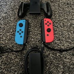 Nintendo Switch Joy Cons, Charger, And Controller