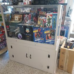 DISPLAY CASE WITH BOTTOM STORAGE