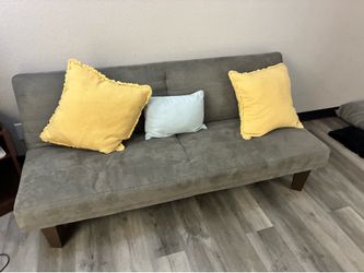 Futon with pillows