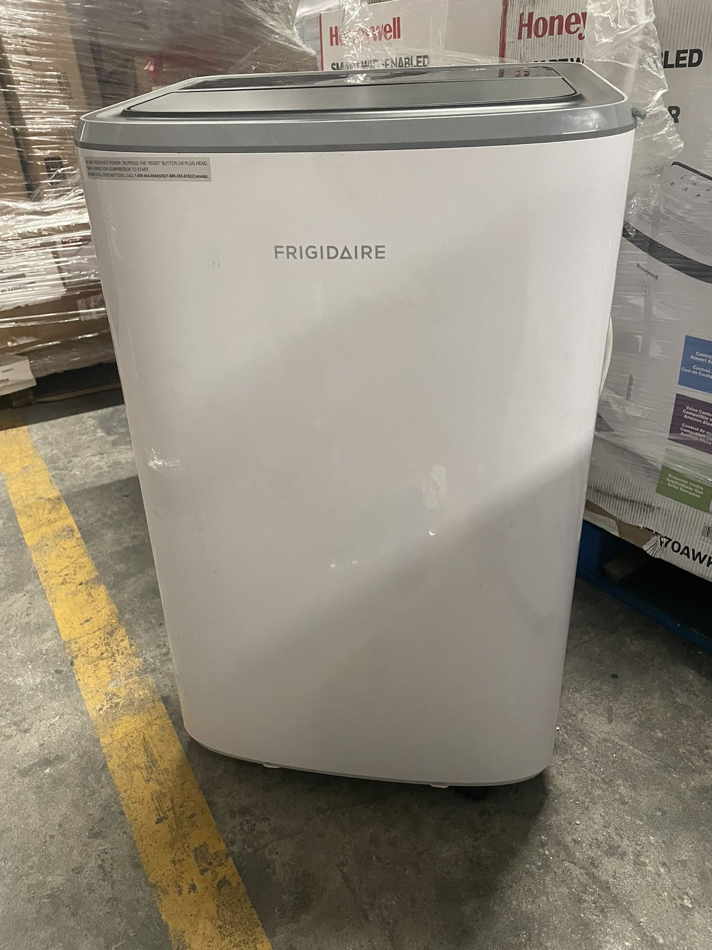 Frigidaire FHPC102AC1 Portable Room Air Conditioner, 6500 BTU with Multi-Speed Fan, Dehumidifier Mode, Built-in Air Ionizer, Easy-to-Clean Washable Fi