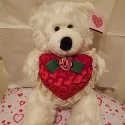 Teddy Bear Holding A Red Heart