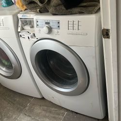 kenmore washer wear and tear on the outside but still works 