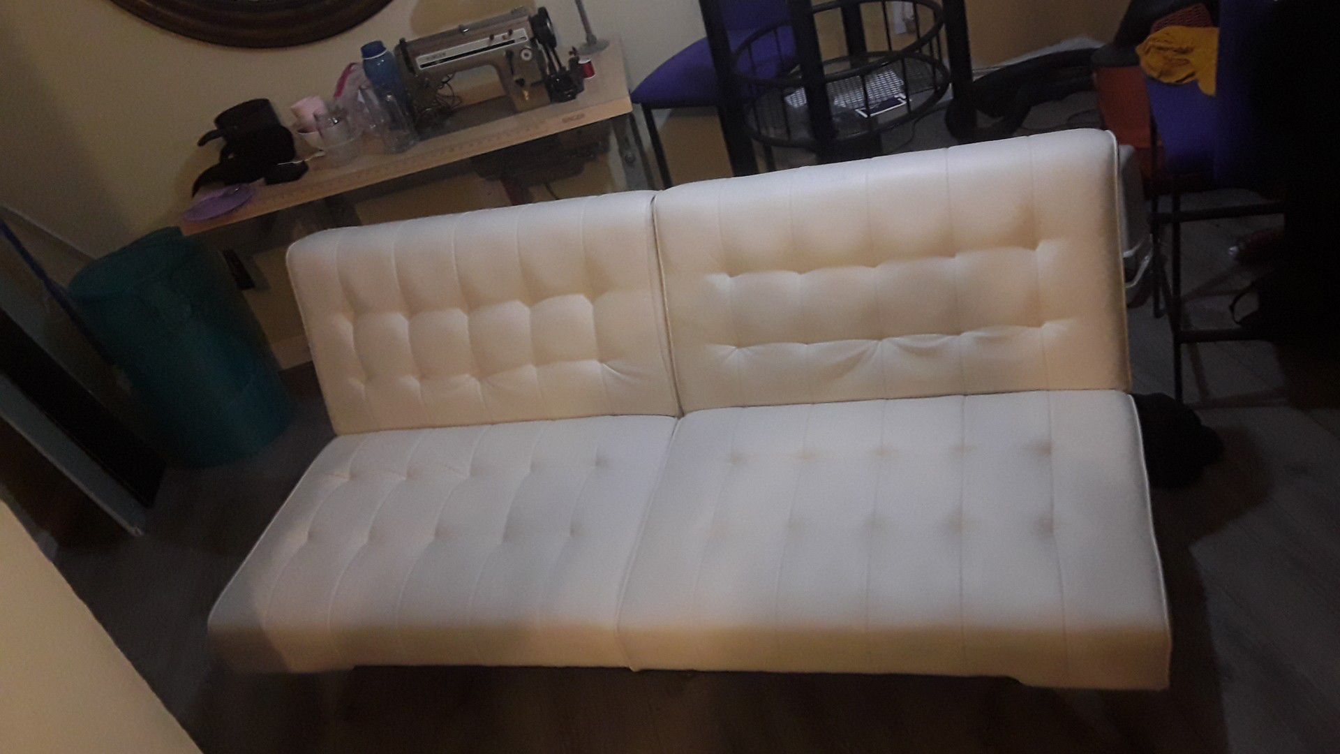 Plush White Leather futon w dual folding sides.