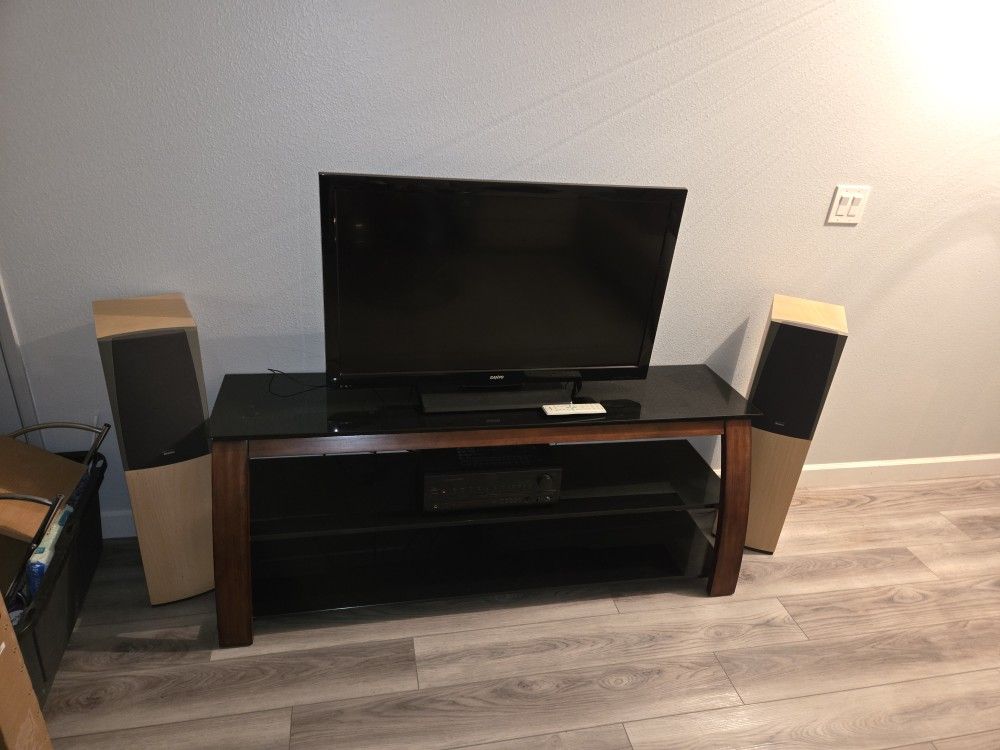 Flatscreen Sanyo TV. Stereo And Entertainment Stand. 