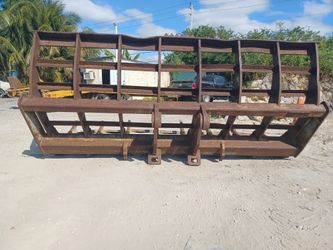 Komatsu root rake.