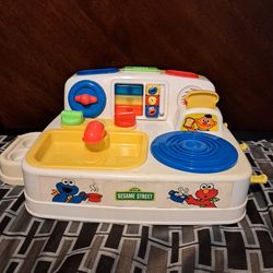 1997 vintage sesame street toy kitchen 
