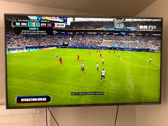 LG 65in HD TV with wall bracket