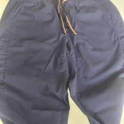 SizeLarge.  Unisex Cargo Scrub Pants with an elastic waistband and drawstring.  