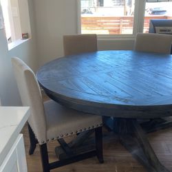 Fairly new kitchen table with six chairs