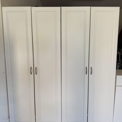 (2) white cabinets with adjustable shelves