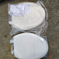 $ 4.  ( NEW )  2   TOILET LIDS 