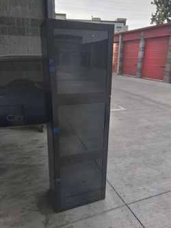 Ikea tall cabinet with glass shelves