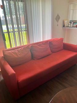 Orange futon couch