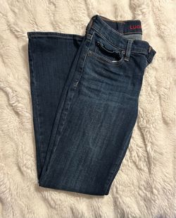 Woman’s mid rise bootcut lucky bean jeans