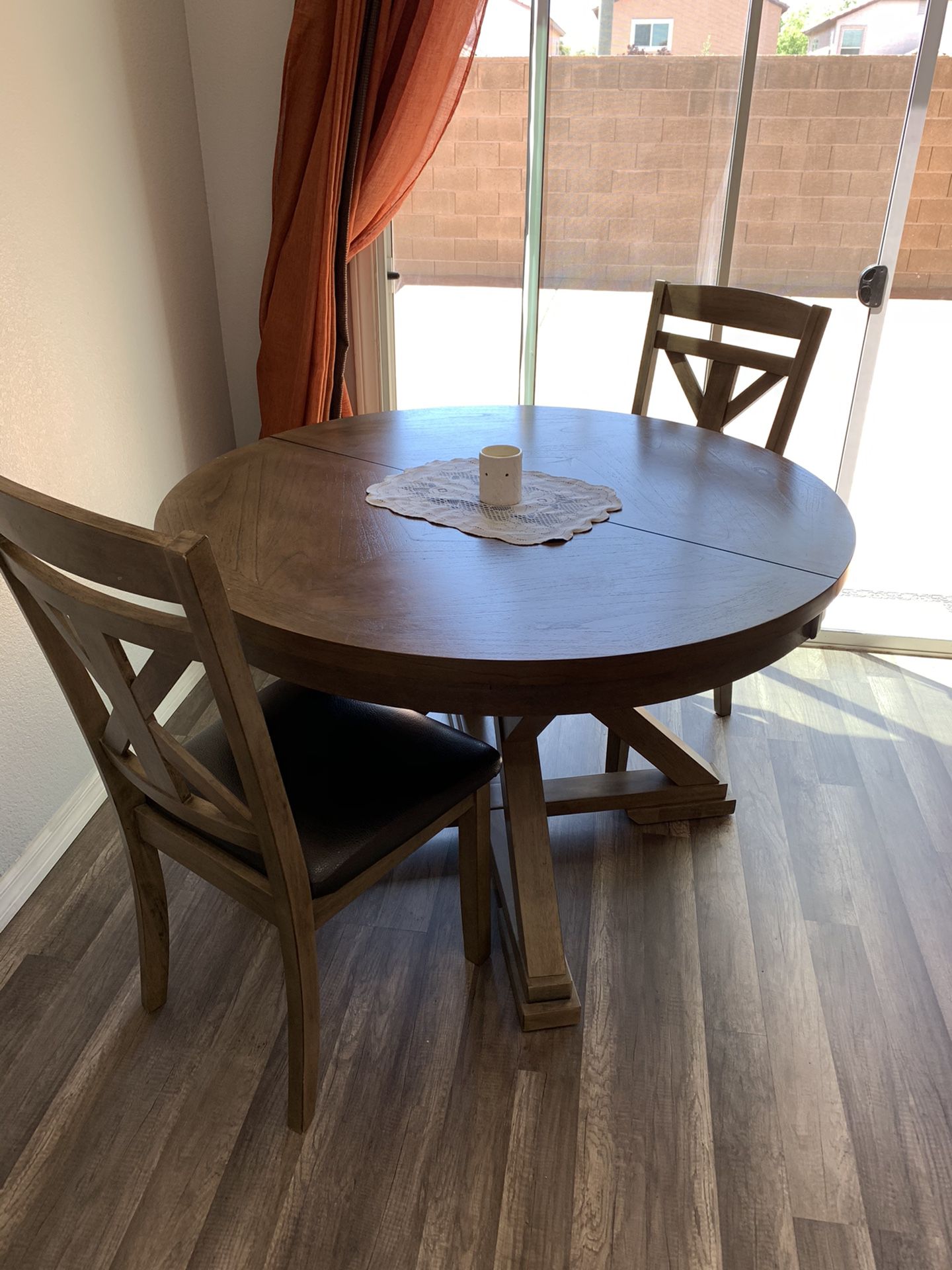 4’ round wooden dining table and 2 chairs
