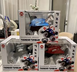 Sharper Image Thunder Tumbler Remote Control 360 Degree Rotating Car. red, blue and black Color