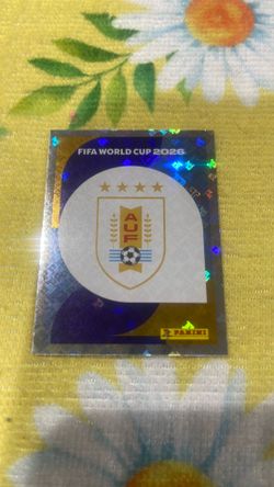Cromo Panini Mundial 2026 Uruguay Escudo Gold