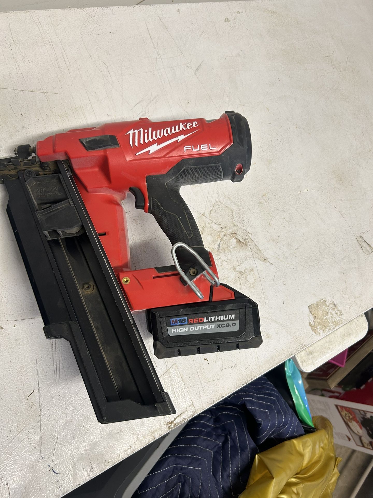 Nail gun and battery