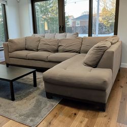 Dark brown l-shaped sectional with Chase