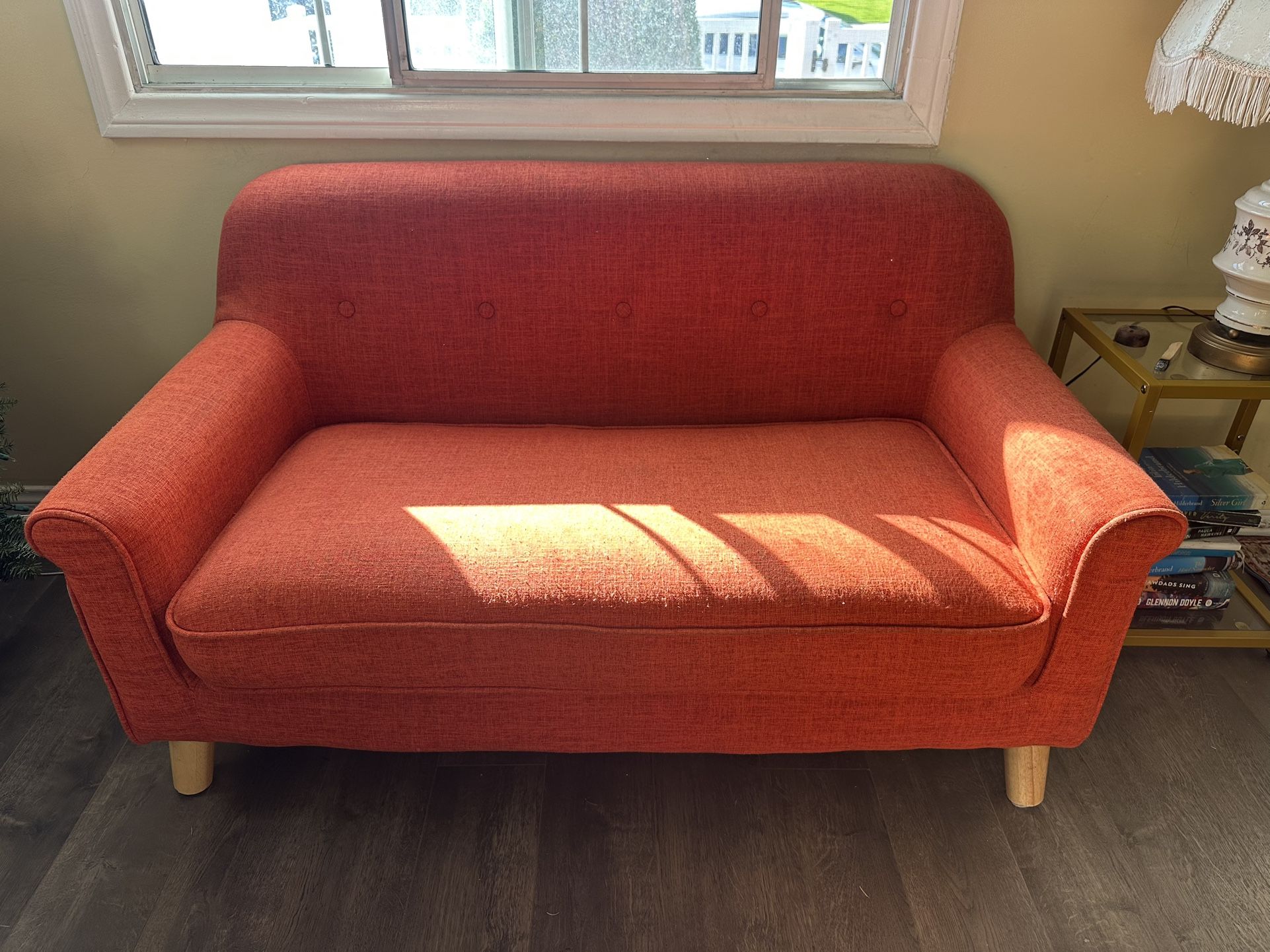Small orange loveseat - Moving sale! 