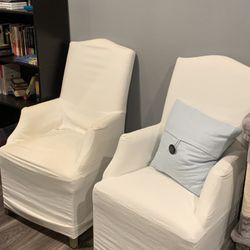 Gorgeous White Upholstered Chairs with White Slip Covers