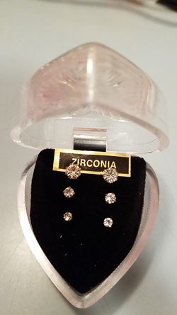 3 pair of zirconia earrings. New in heart shape box