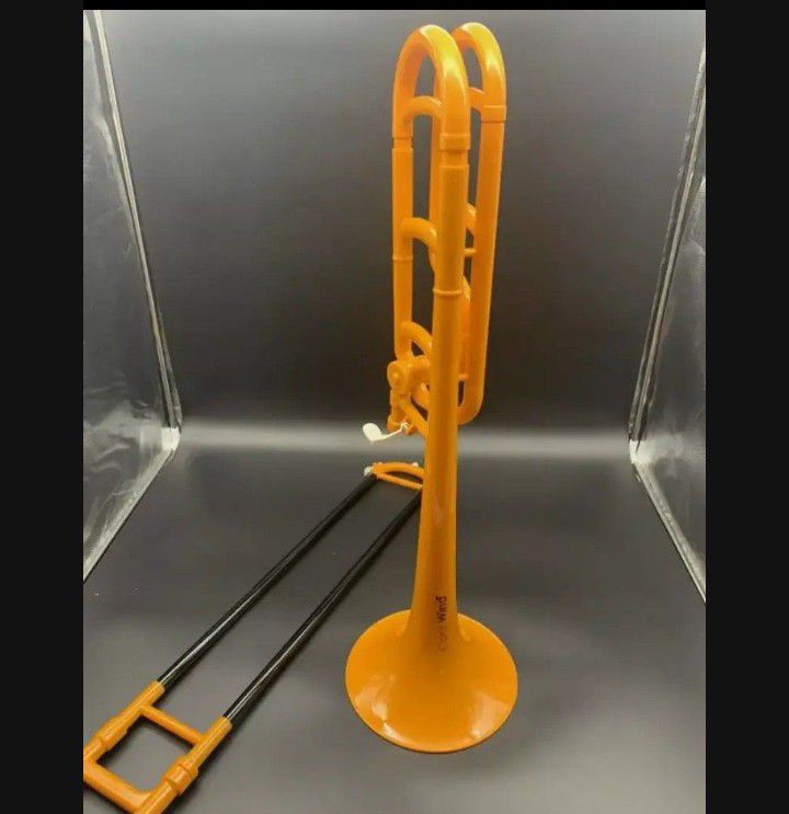 Cool wind F-Attachment plastic trombone.  ........ CHECK OUT MY PAGE FOR MORE ITEMS