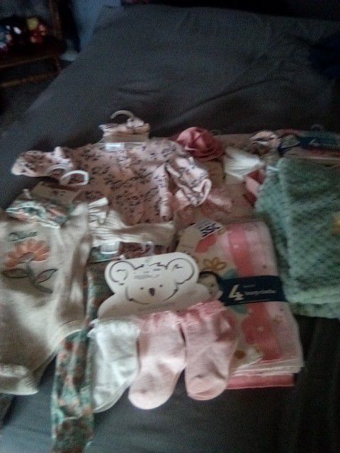 Baby Clothes And Blankets 