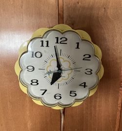 Vintage general electric Daisy wall clock